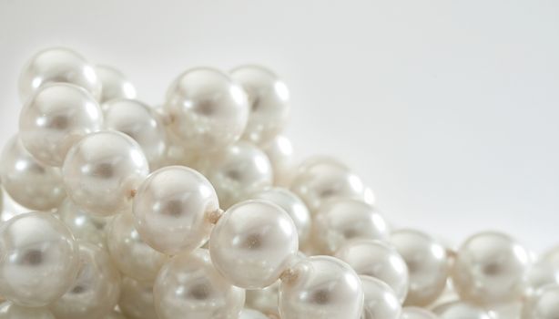 String of pearls on white 