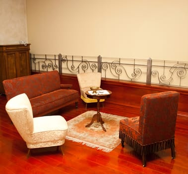 Old fashion sitting room with sofa