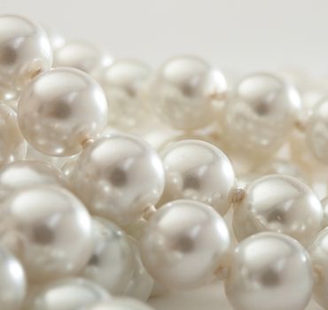 String of pearls on white 