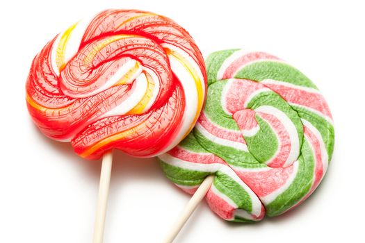 Bright lollipop candy on white background