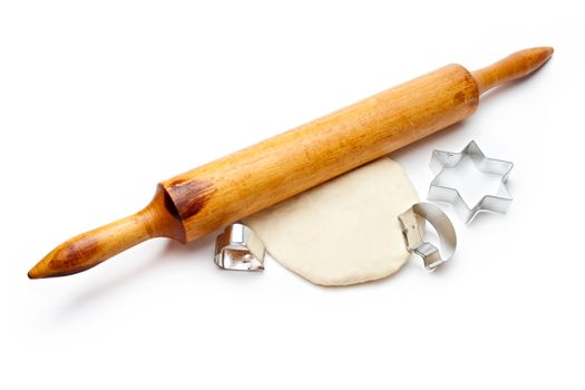 Rolling pin with dough and cookie forms