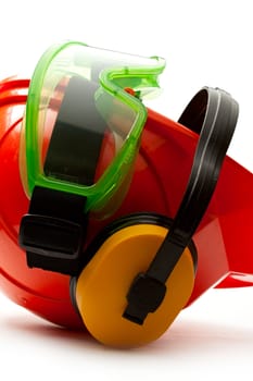 Red safety helmet with earphones and goggles