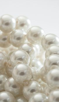 String of pearls on white
