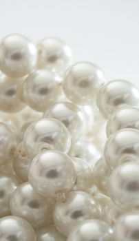 String of pearls on white
