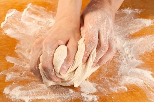 Kneading the dough with hands