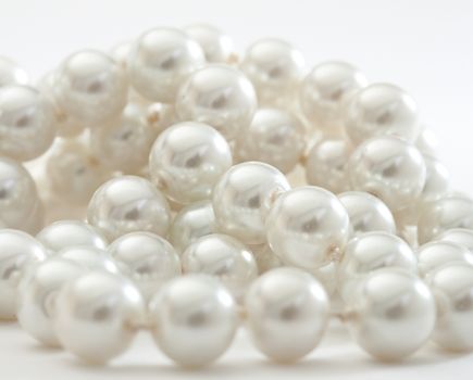 String of pearls on white
