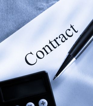 Contract conception with pen and calculator