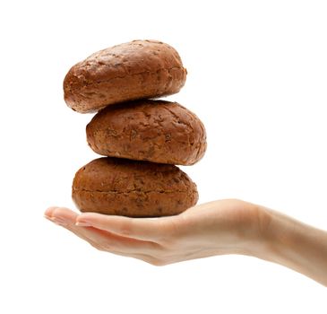 Female hand with brown buns