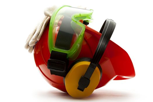Red safety helmet with earphones, goggles and gloves