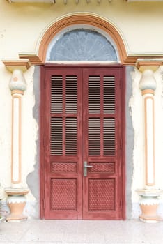Vintage style doors in front of building