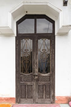 Vintage style doors in front of building