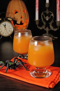 Pumpkin juice with ice on Halloween