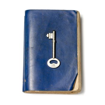 blue color old book with key on a white background