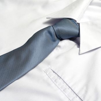 cloth white shirt with blue neck tie