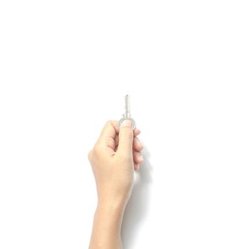 woman hand holding key on a white background