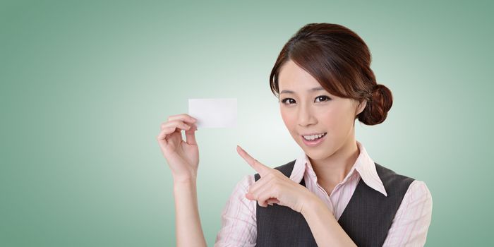 Cheerful business woman holding blank business card, closeup portrait with clipping path.