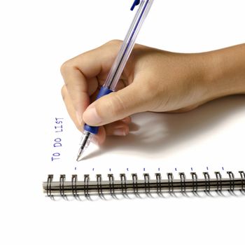 woman hand writing with pen on notebook write to do word over white background
