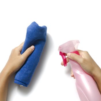 two woman hands cleaning with spray bottle and blue rag on a white background