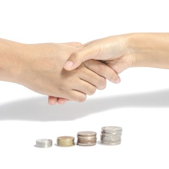 two people shake hand and coin business concept