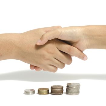 two people shake hand and coin business concept