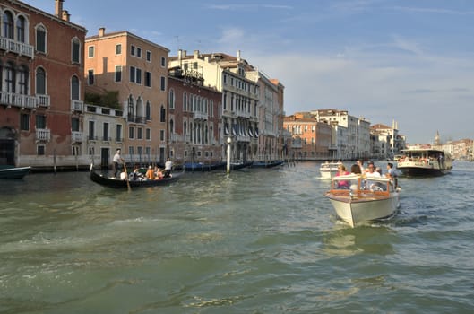 Boats cruising down the Grand Canal in Venice, Italy. 