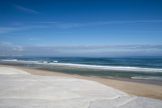 Landscape view of a beach with an amazing blue sky