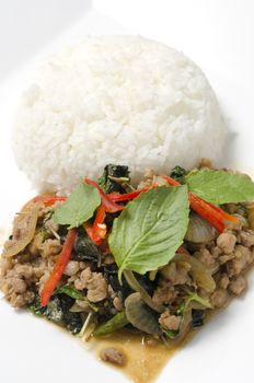 Thai main food Rice topped with stir-fried pork and basil