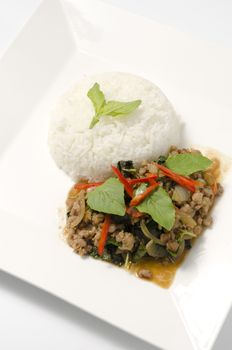 Thai main food Rice topped with stir-fried pork and basil
