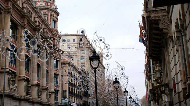 Christmas street in Barcelona, Spain. Different houses and decorations