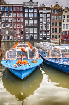 Amsterdam. Wonderful view of city canals and buildings in spring season.