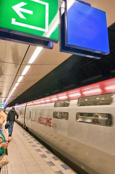 AMSTERDAM, APR 29: Hi speed train arrives in Airport Station, April 29, 2013 in Amsterdam. Schiphol railway station is a major passenger railway station in Haarlemmermeer, Netherlands.