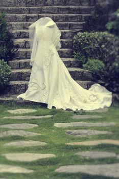 White wedding gown shot in a garden 