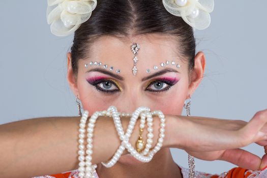 Beautiful Indian girl dancing in national dress