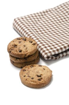 chocolate chip cookies with kitchen towel on a white background
