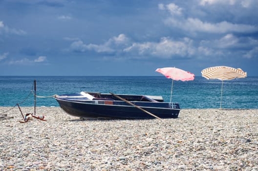 Old boat standing on the shore