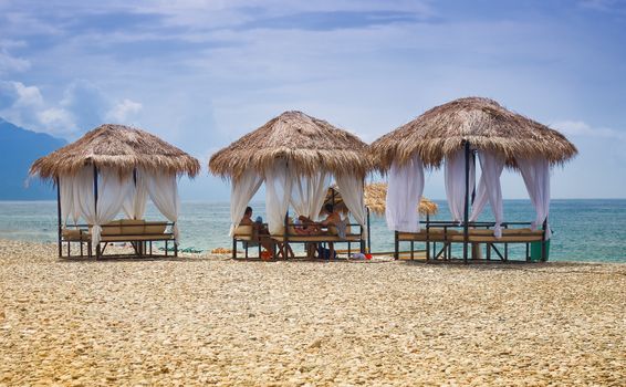 beach gazebos with thatched roofs