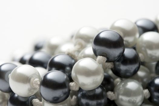 String of black and white pearls