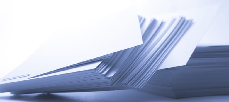 Stack of paper cards in blue