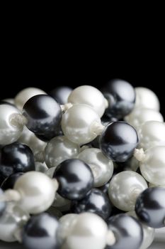 String of black and white pearls