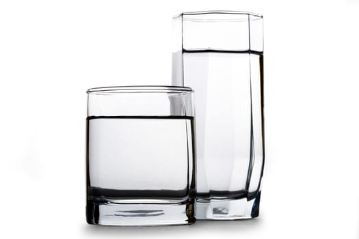 Two glasses of water on white background