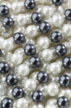 String of black and white pearls