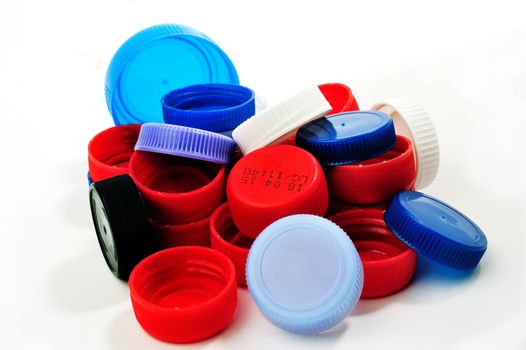Recovery caps of plastic bottles for recycling.