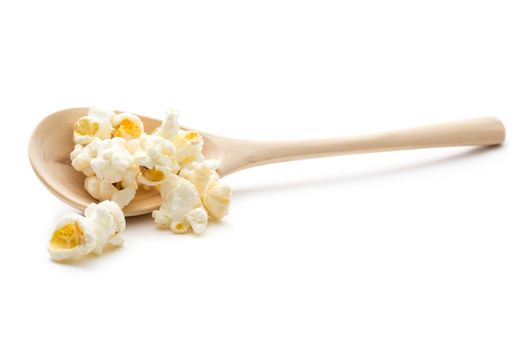 Popcorn on the wooden spoon