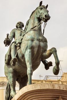 King Carlos III Equestrian Statue Puerta del Sol Gate of the Sun Most Famous Square in Madrid Spain King of Spain in the 1700s.  Replica of statue created in 1700s by Juan Pascal de de Mena