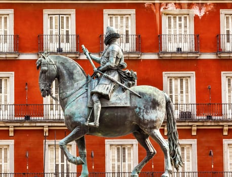 Plaza Mayor Built in the 1617 Famous Square Cityscape Madrid Spain. King Philip III Equestrian Statue created in 1616 by Sculptors Gambologna and Pietro Tacca