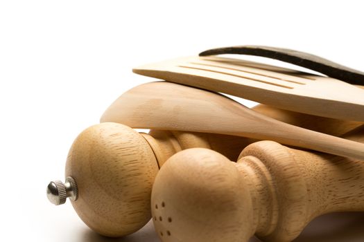 Wooden salt and pepper set with kitchen utensils