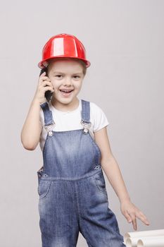 Girl playing Builder talking on the phone