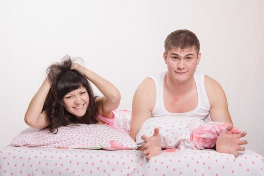 Young couple disappointed missed chance lie in bed