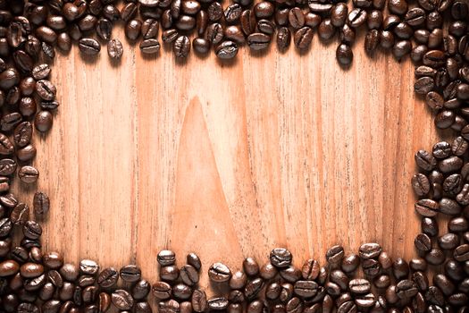 Coffee on teak wooden background