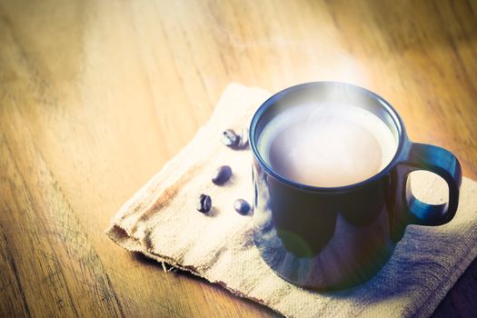 Coffee cup and coffee beans, vintage style